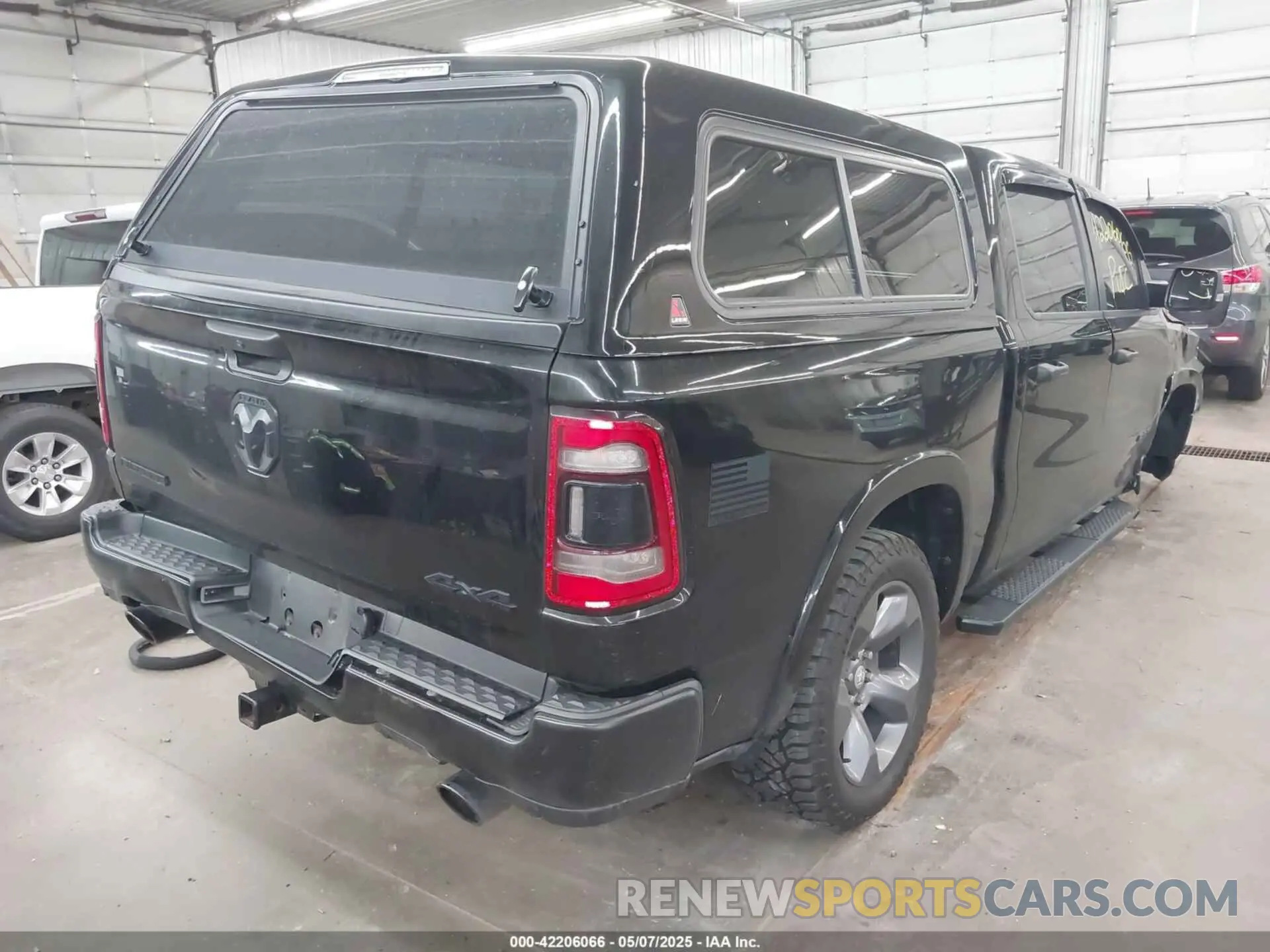 4 Photograph of a damaged car 1C6SRFFT8LN308129 RAM 1500 2020