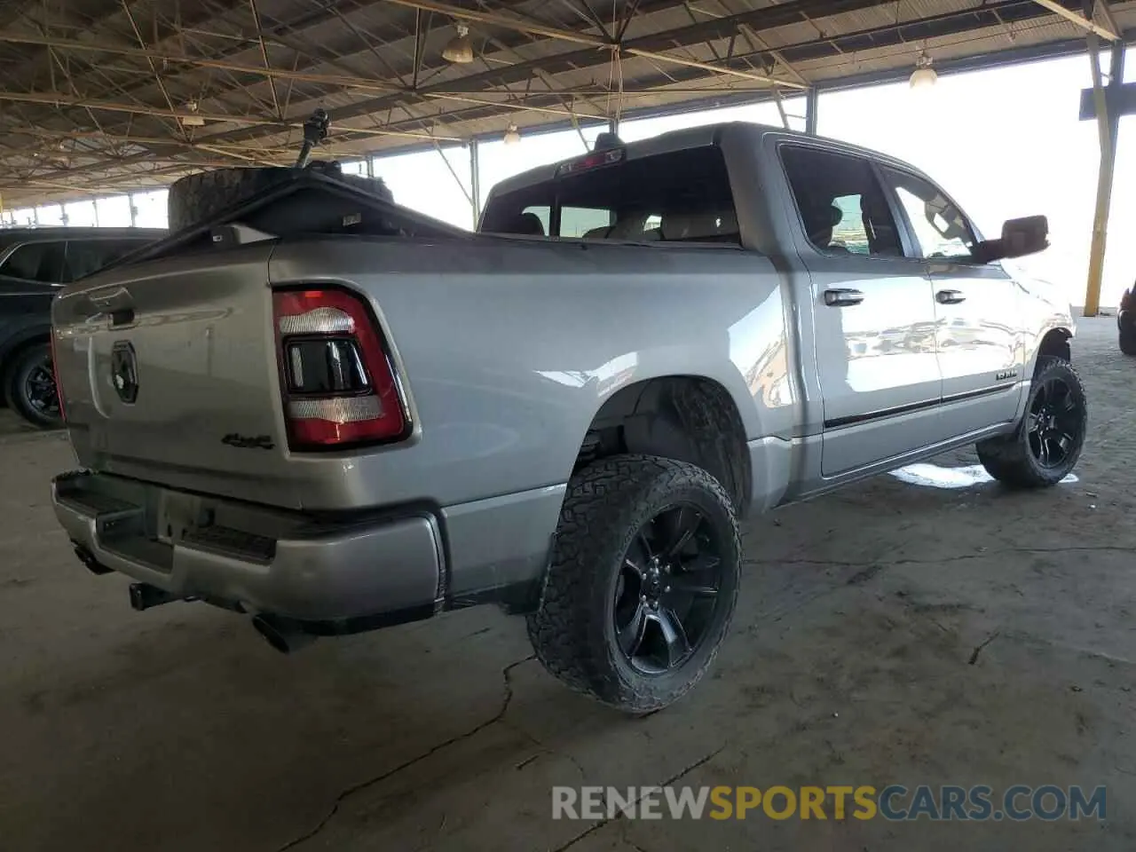 3 Photograph of a damaged car 1C6SRFFT9LN299876 RAM 1500 2020