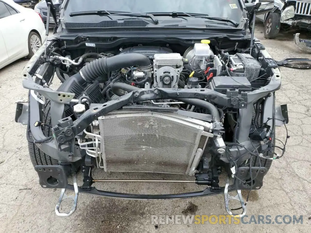 11 Photograph of a damaged car 1C6SRFHT0LN104647 RAM 1500 2020