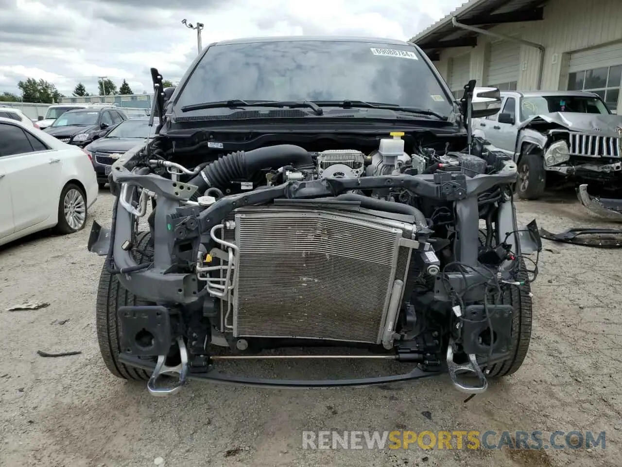 5 Photograph of a damaged car 1C6SRFHT0LN104647 RAM 1500 2020
