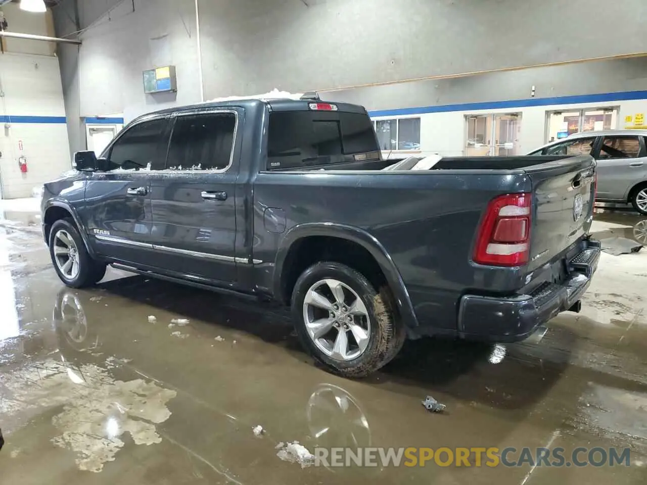 2 Photograph of a damaged car 1C6SRFHT5LN290234 RAM 1500 2020