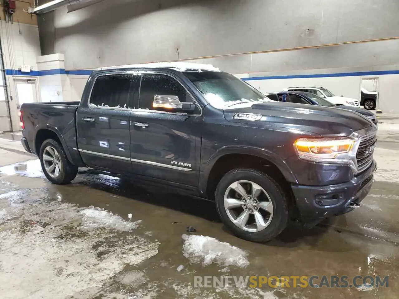 4 Photograph of a damaged car 1C6SRFHT5LN290234 RAM 1500 2020