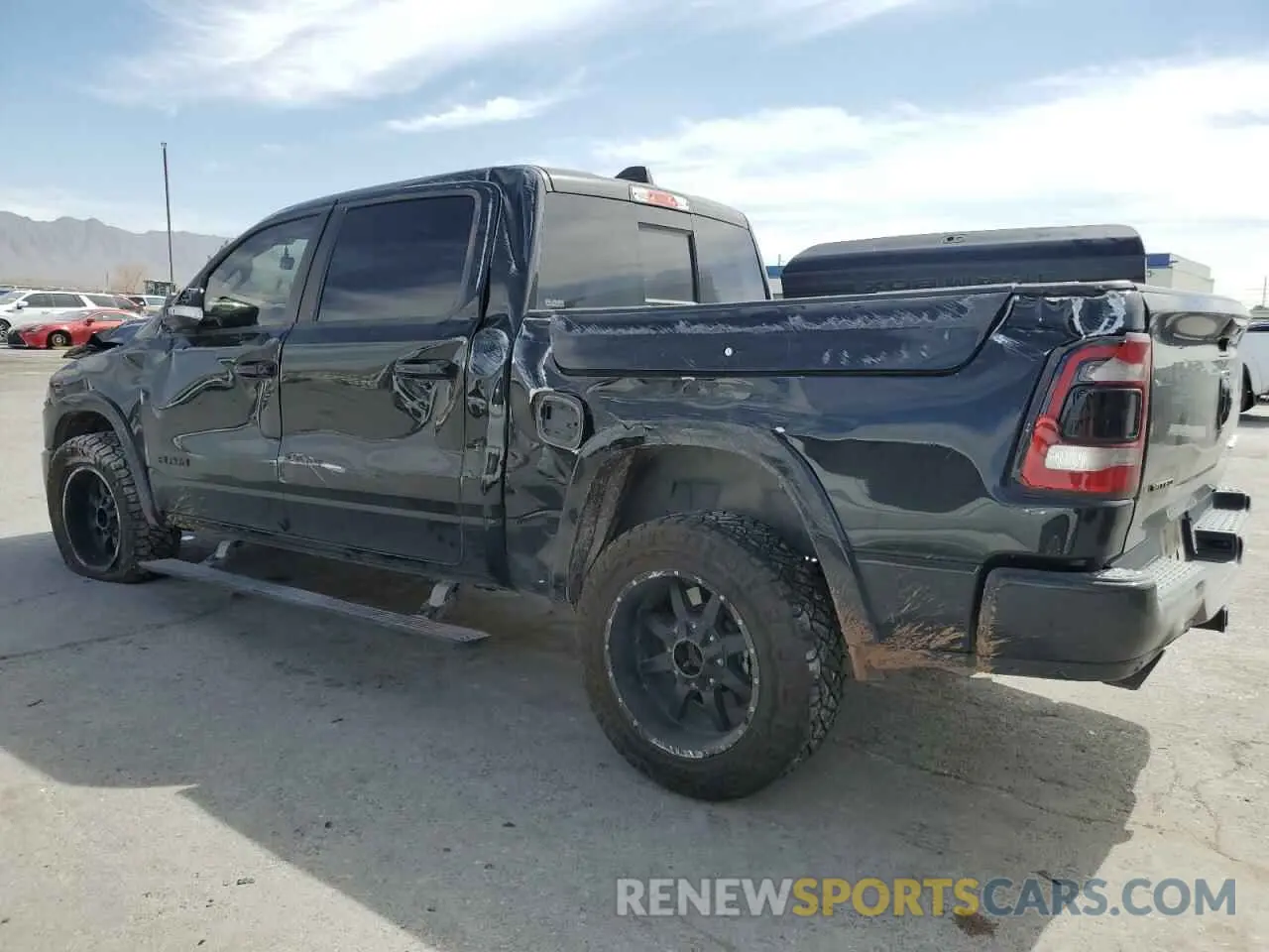2 Photograph of a damaged car 1C6SRFHT7LN382736 RAM 1500 2020