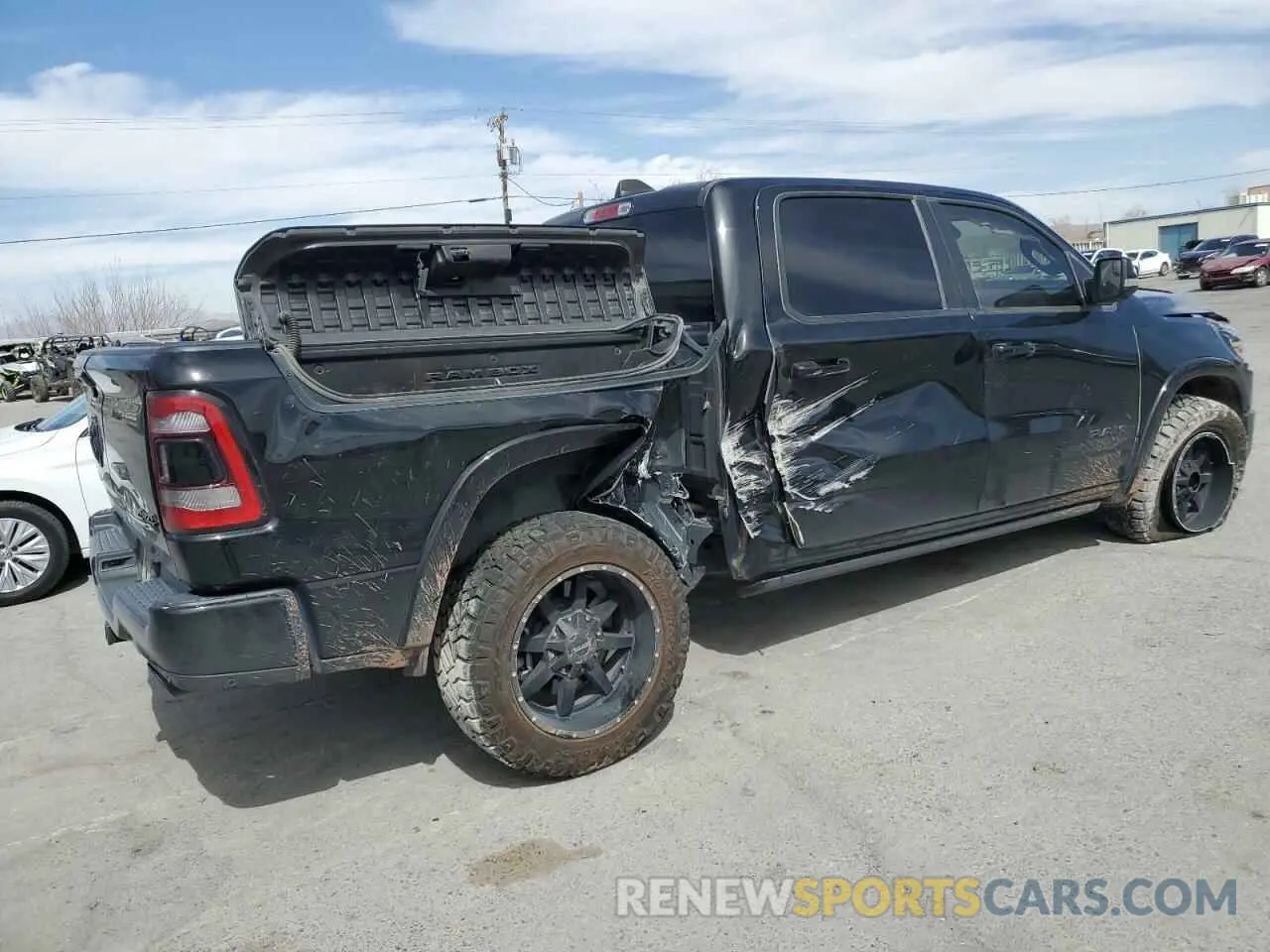 3 Photograph of a damaged car 1C6SRFHT7LN382736 RAM 1500 2020