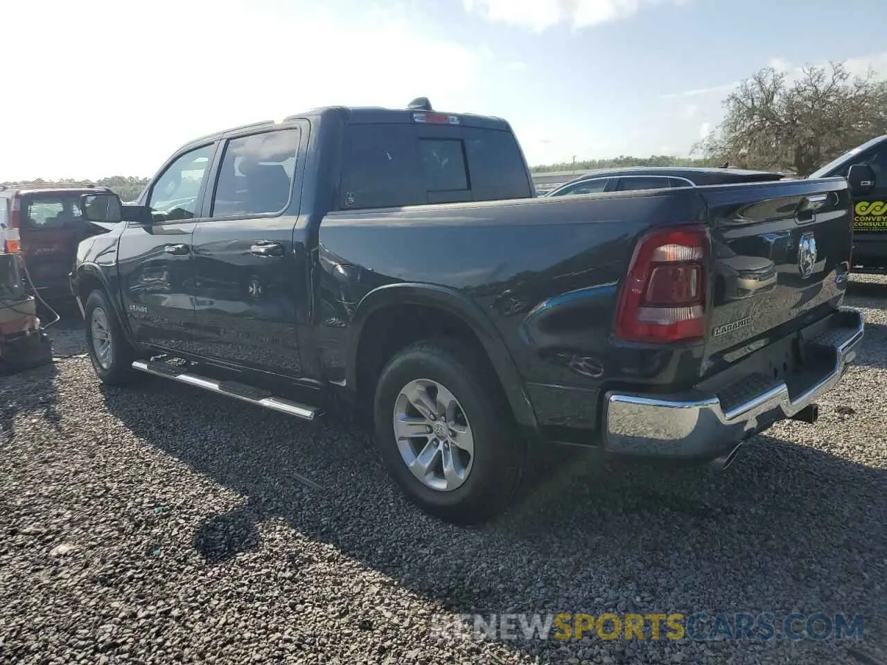 2 Photograph of a damaged car 1C6SRFJT0LN409754 RAM 1500 2020