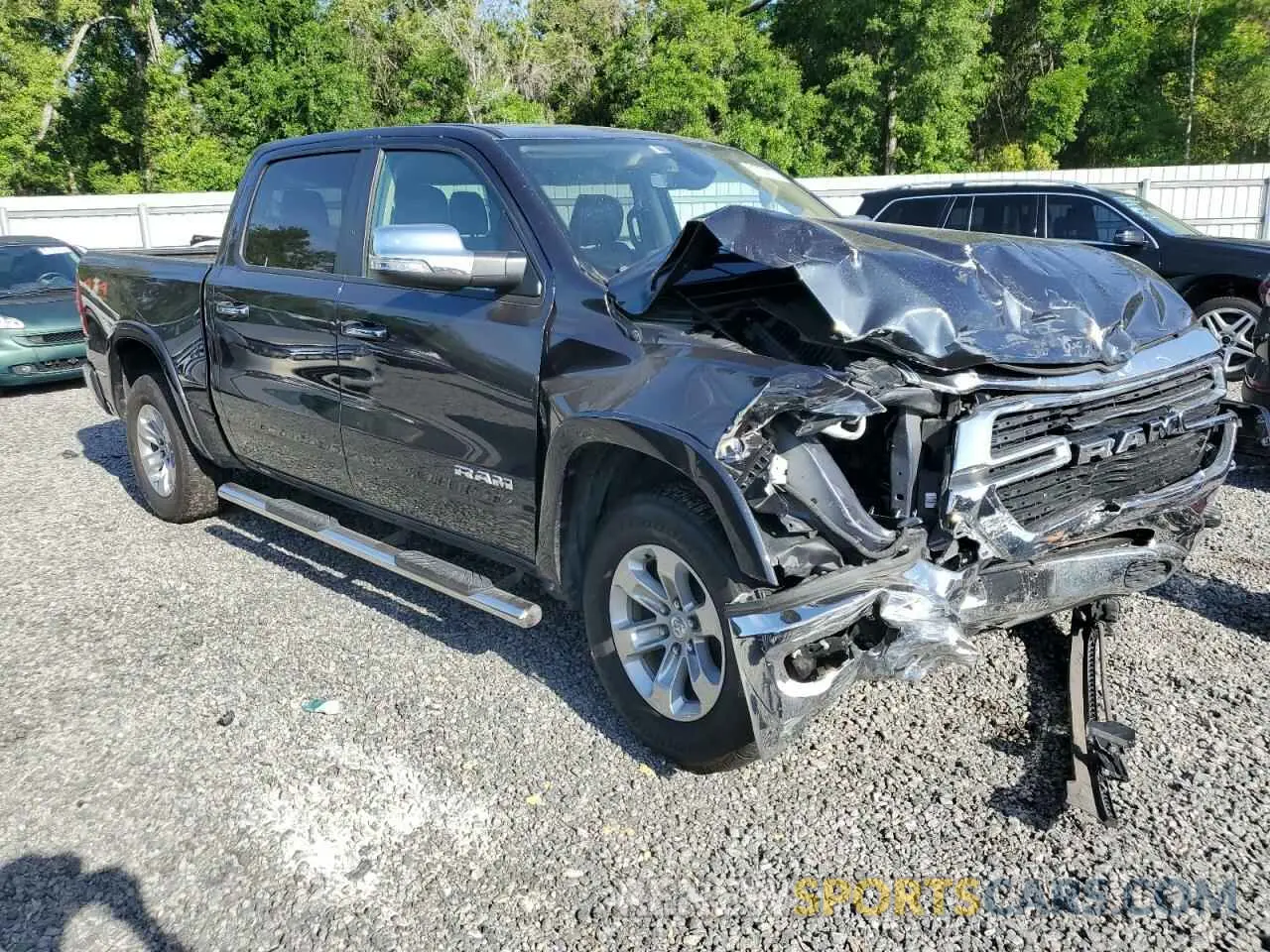4 Photograph of a damaged car 1C6SRFJT0LN409754 RAM 1500 2020