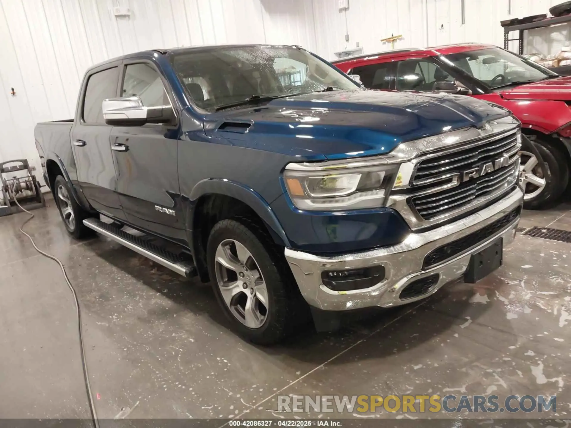 1 Photograph of a damaged car 1C6SRFJT2LN212021 RAM 1500 2020