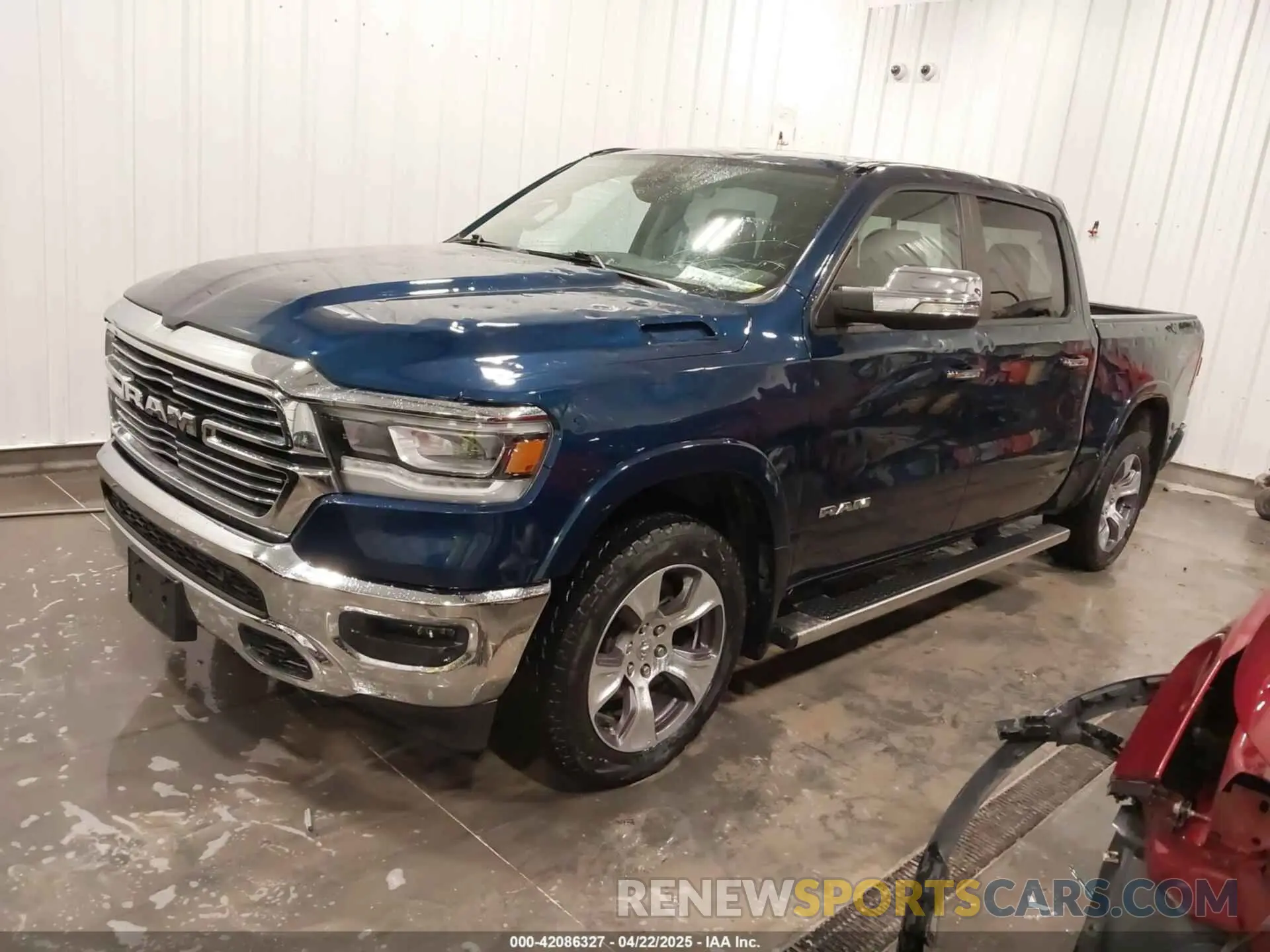 2 Photograph of a damaged car 1C6SRFJT2LN212021 RAM 1500 2020