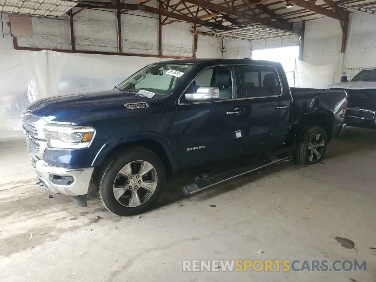 1 Photograph of a damaged car 1C6SRFJT2LN309512 RAM 1500 2020