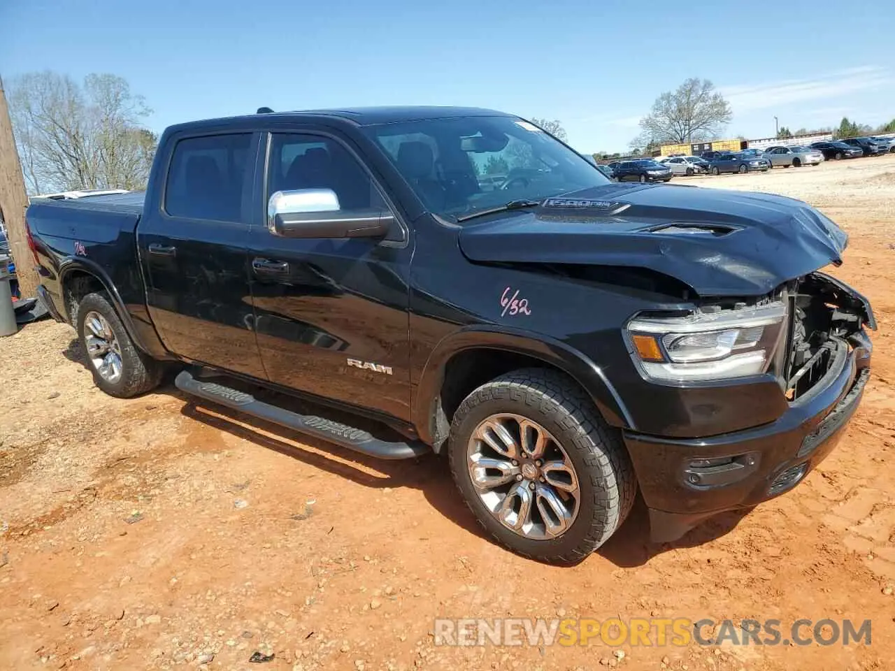 4 Photograph of a damaged car 1C6SRFJT2LN325273 RAM 1500 2020