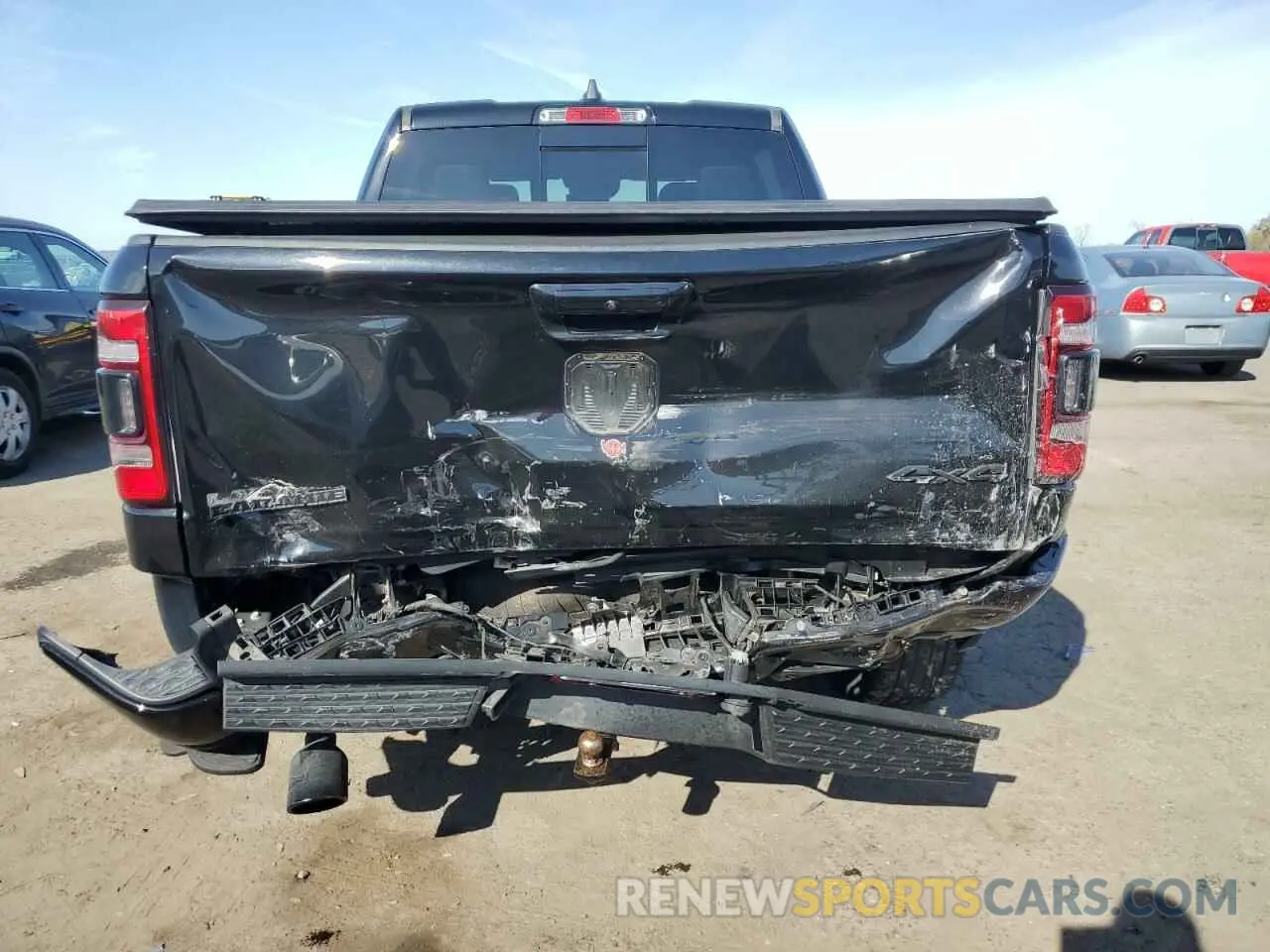 6 Photograph of a damaged car 1C6SRFJT3LN374448 RAM 1500 2020