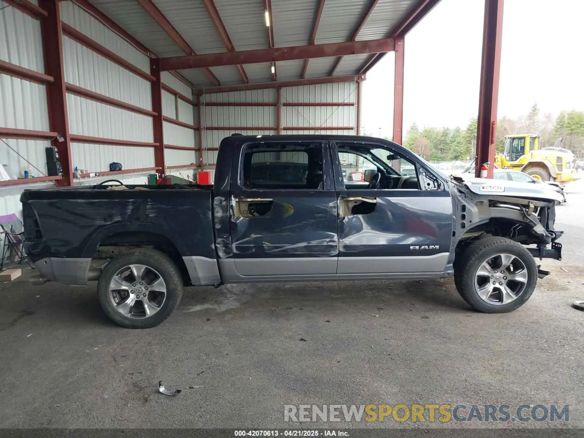 14 Photograph of a damaged car 1C6SRFJT7LN416460 RAM 1500 2020