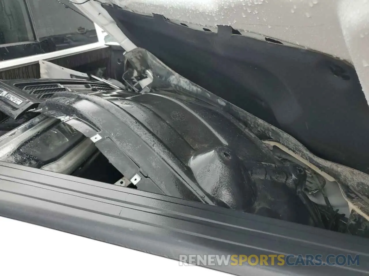 12 Photograph of a damaged car 1C6SRFJT9LN143232 RAM 1500 2020