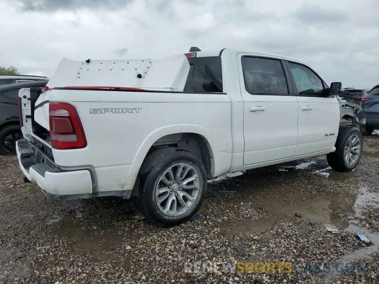 3 Photograph of a damaged car 1C6SRFJT9LN143232 RAM 1500 2020