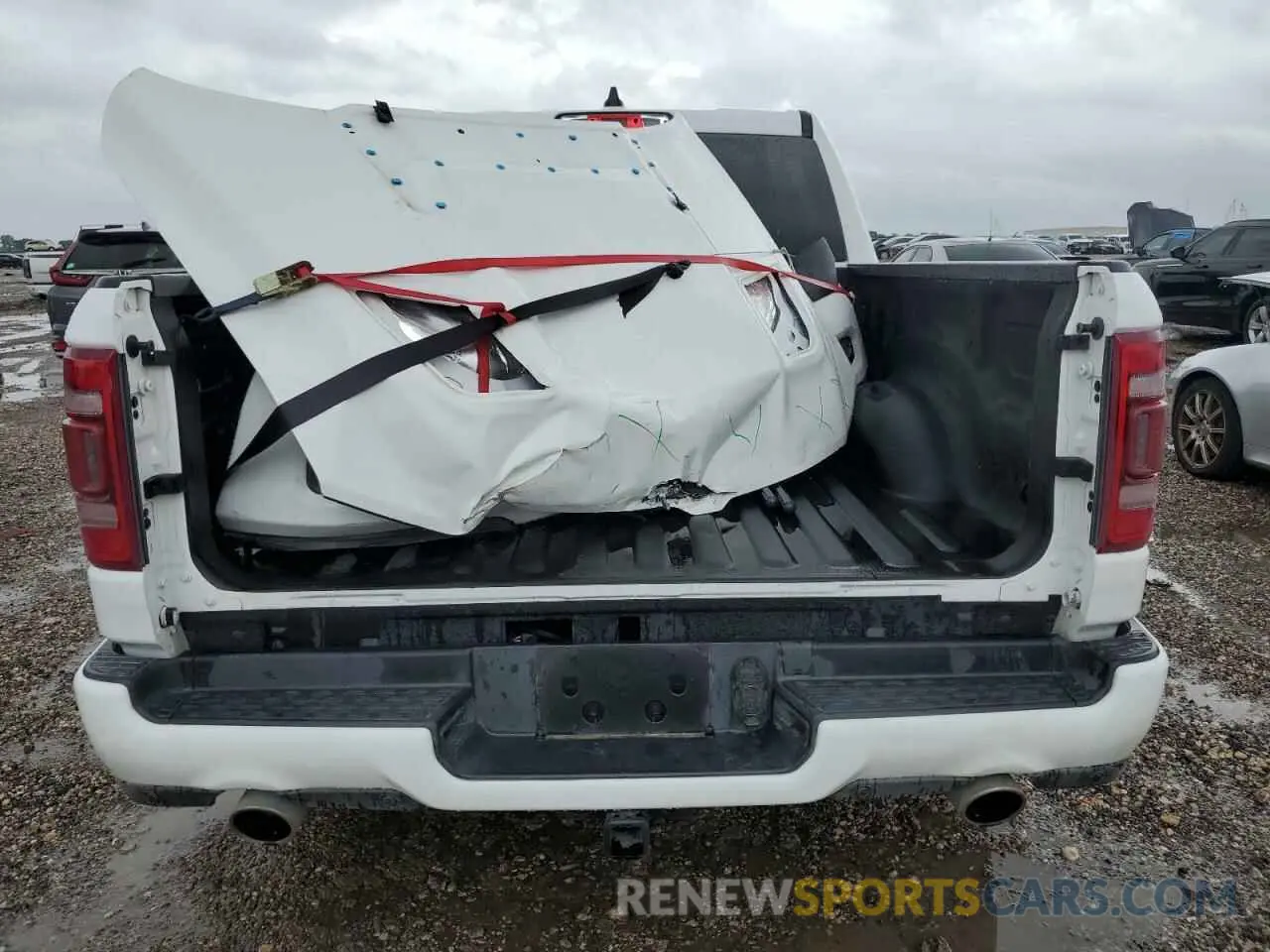 6 Photograph of a damaged car 1C6SRFJT9LN143232 RAM 1500 2020