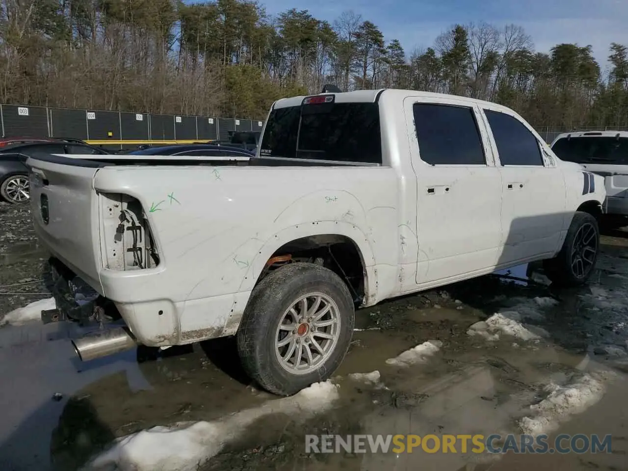 3 Photograph of a damaged car 1C6SRFJT9LN404455 RAM 1500 2020
