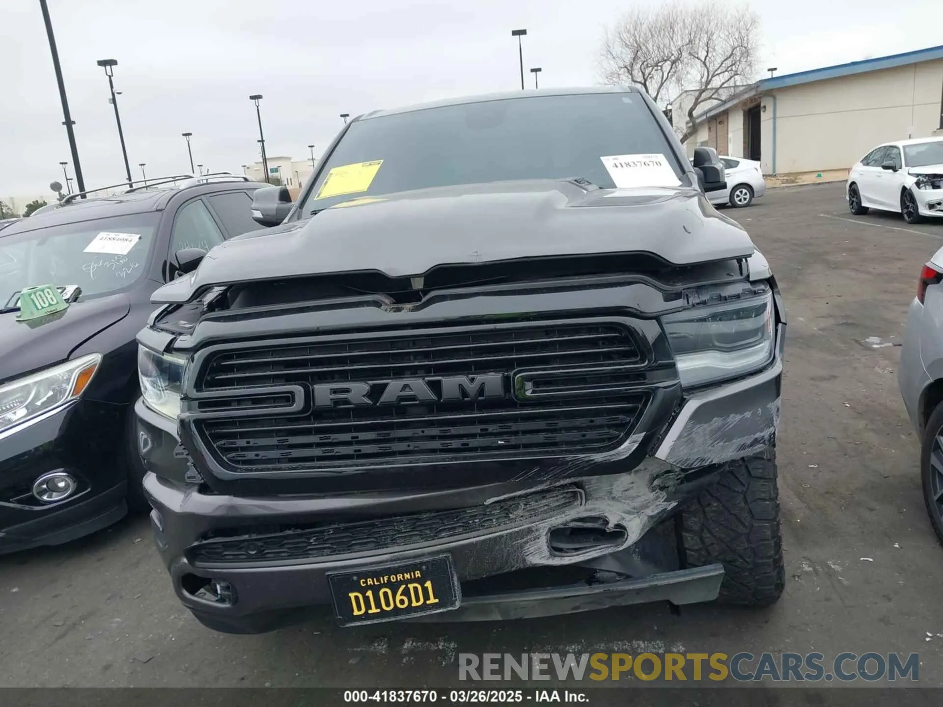13 Photograph of a damaged car 1C6SRFJTXLN323075 RAM 1500 2020