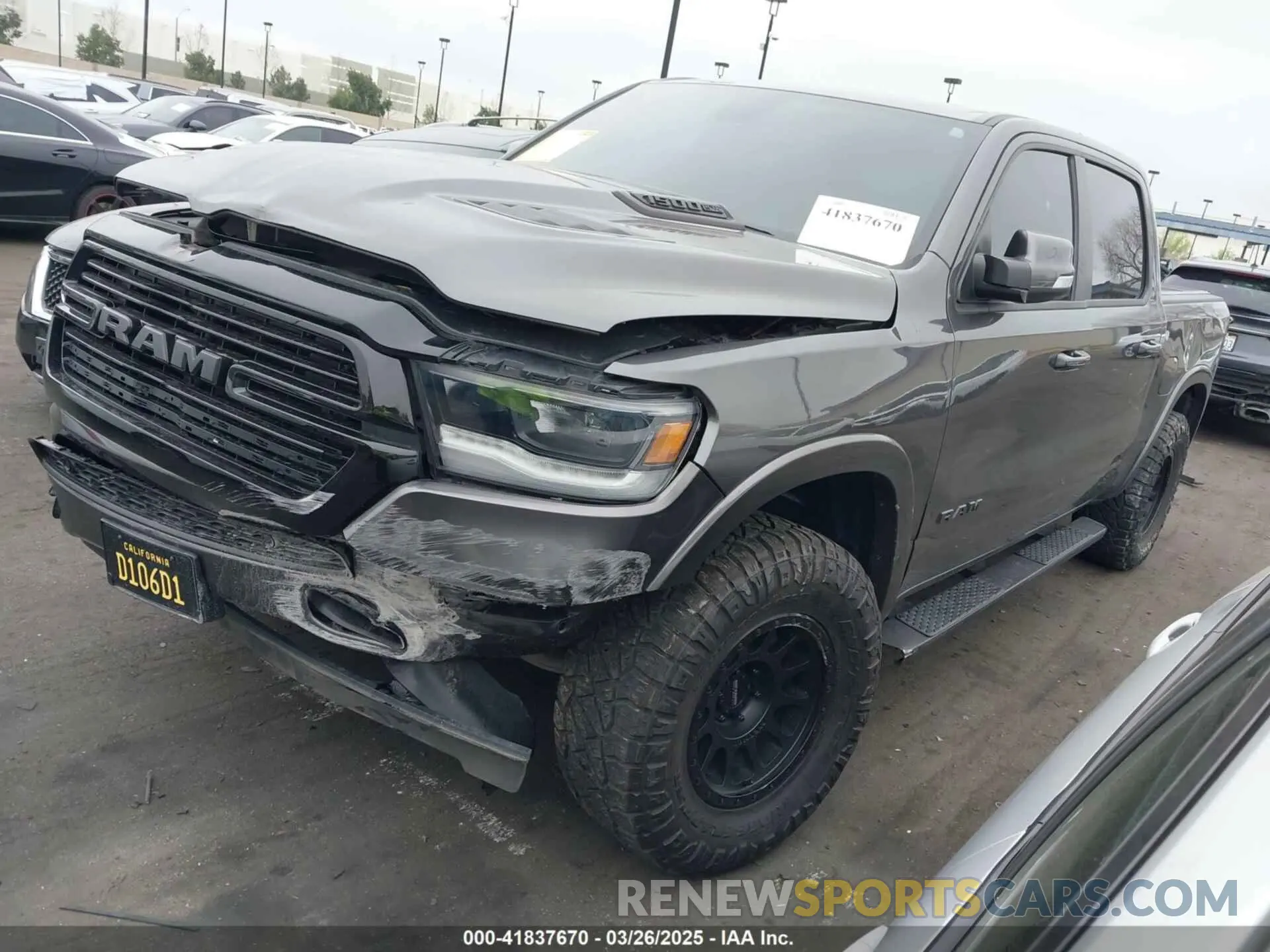 2 Photograph of a damaged car 1C6SRFJTXLN323075 RAM 1500 2020