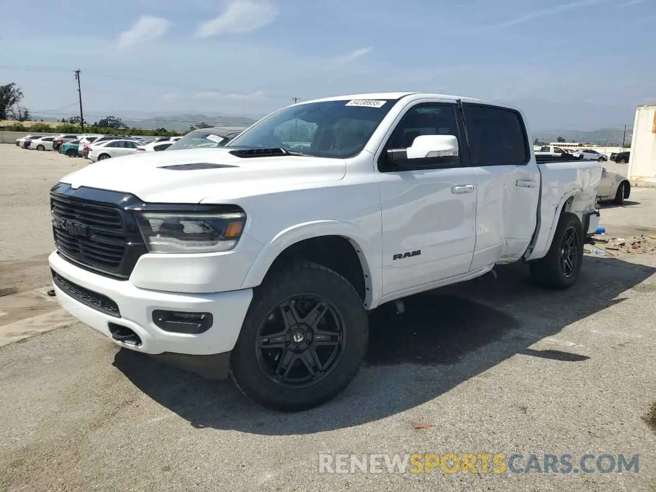 1 Photograph of a damaged car 1C6SRFJTXLN344413 RAM 1500 2020