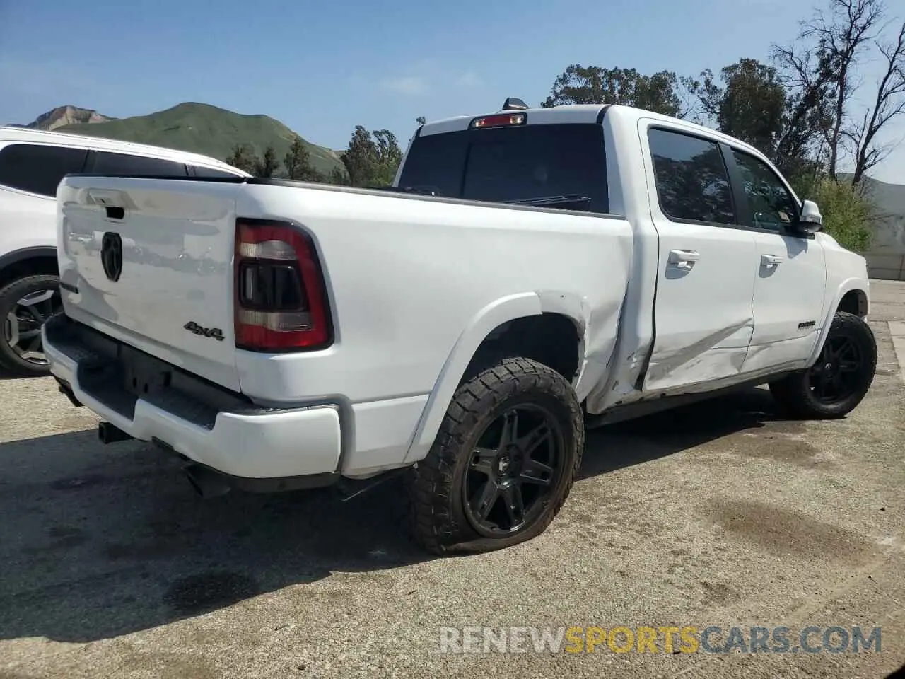 3 Photograph of a damaged car 1C6SRFJTXLN344413 RAM 1500 2020