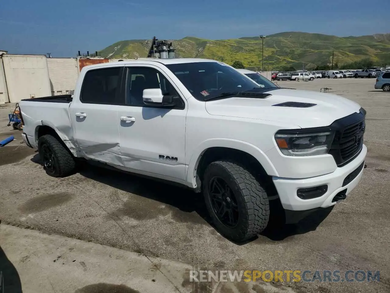 4 Photograph of a damaged car 1C6SRFJTXLN344413 RAM 1500 2020