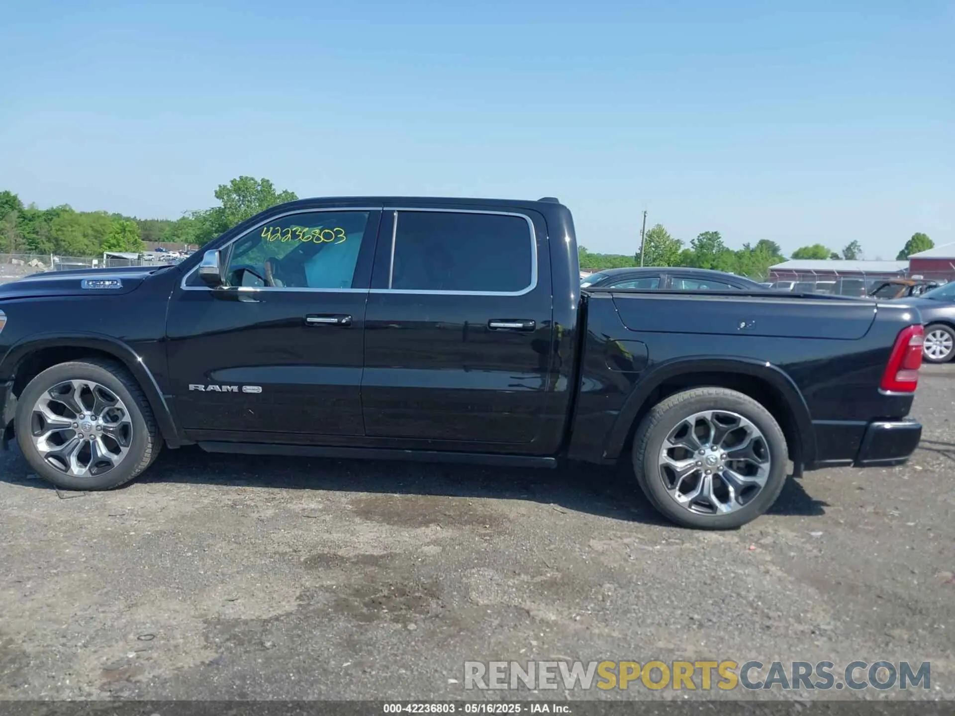 14 Photograph of a damaged car 1C6SRFKT5LN117418 RAM 1500 2020