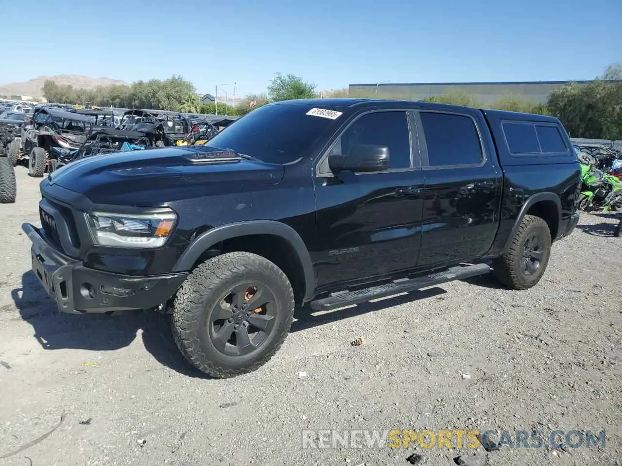 1 Photograph of a damaged car 1C6SRFLM6LN286161 RAM 1500 2020