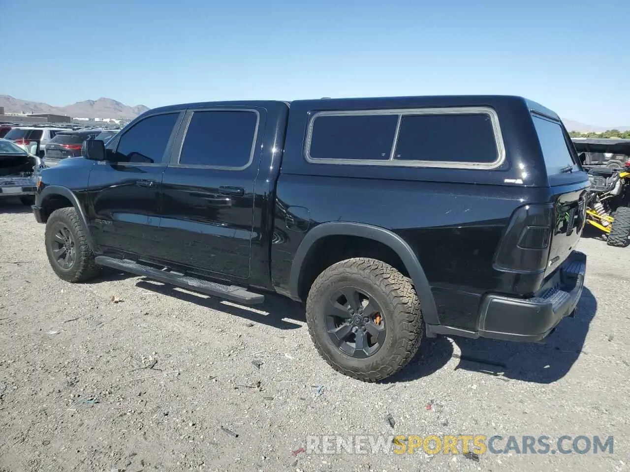 2 Photograph of a damaged car 1C6SRFLM6LN286161 RAM 1500 2020