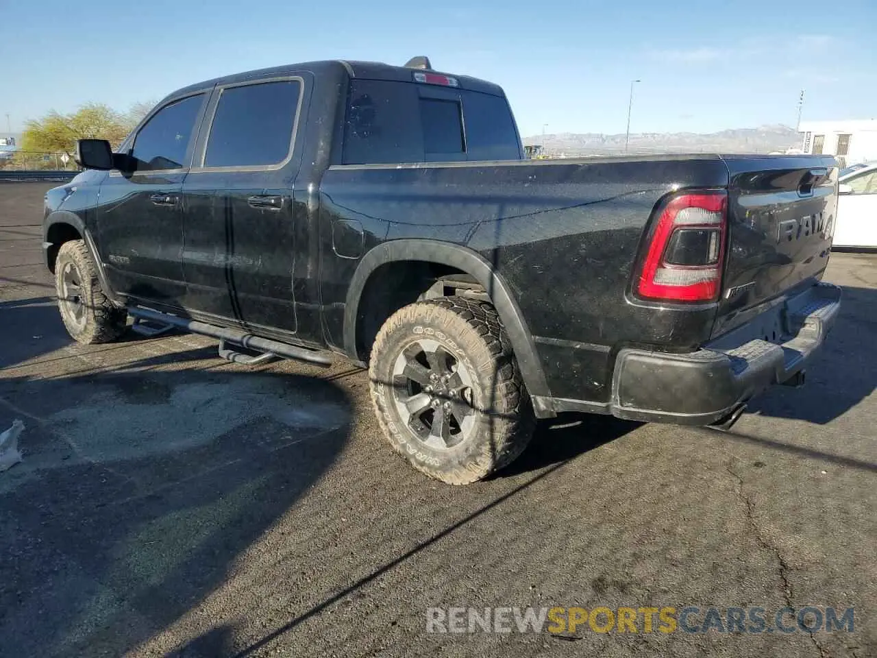 2 Photograph of a damaged car 1C6SRFLT2LN233562 RAM 1500 2020