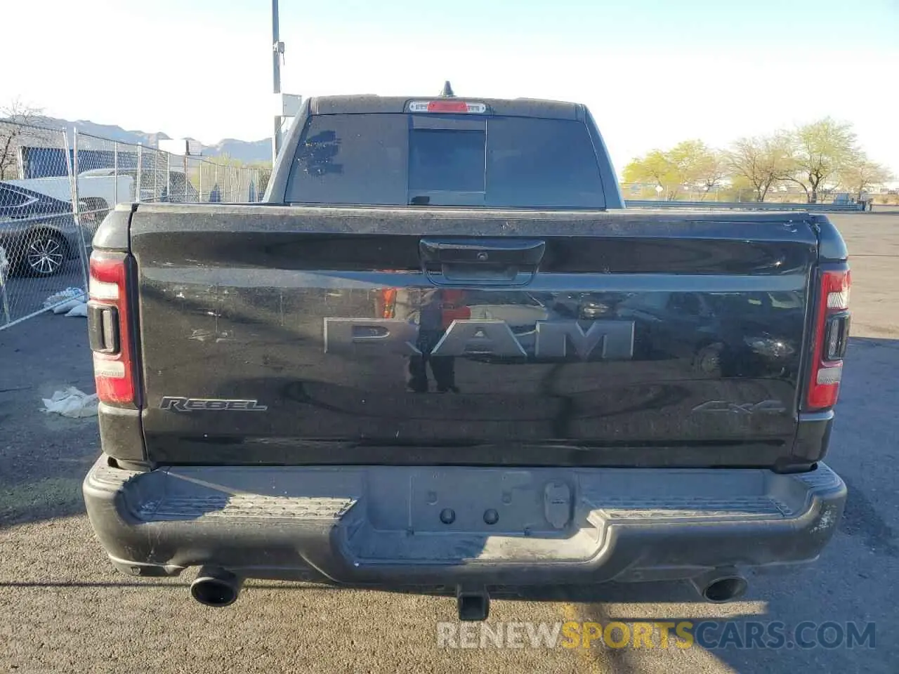 6 Photograph of a damaged car 1C6SRFLT2LN233562 RAM 1500 2020