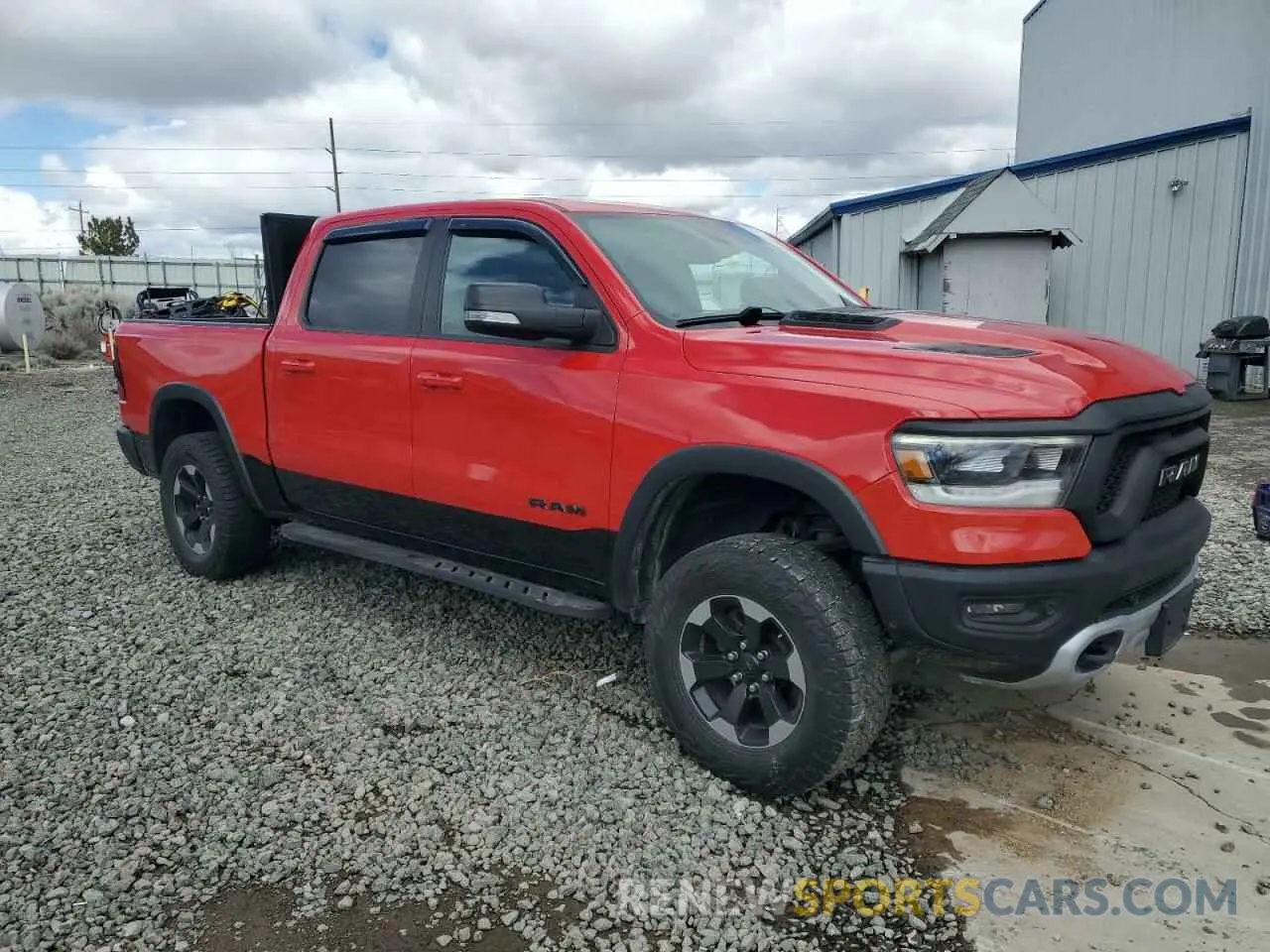 4 Photograph of a damaged car 1C6SRFLT3LN356786 RAM 1500 2020