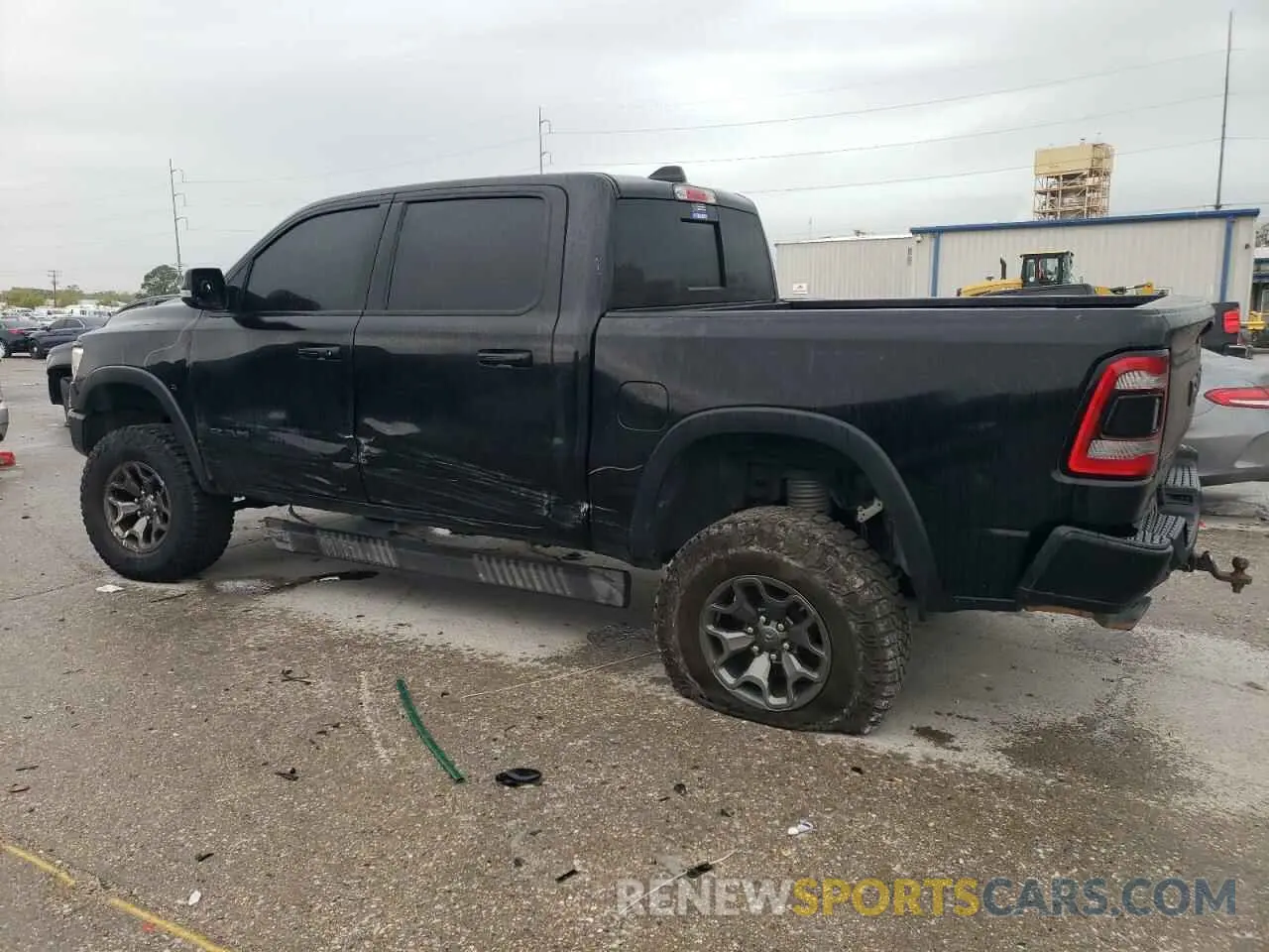 2 Photograph of a damaged car 1C6SRFLT5LN402232 RAM 1500 2020