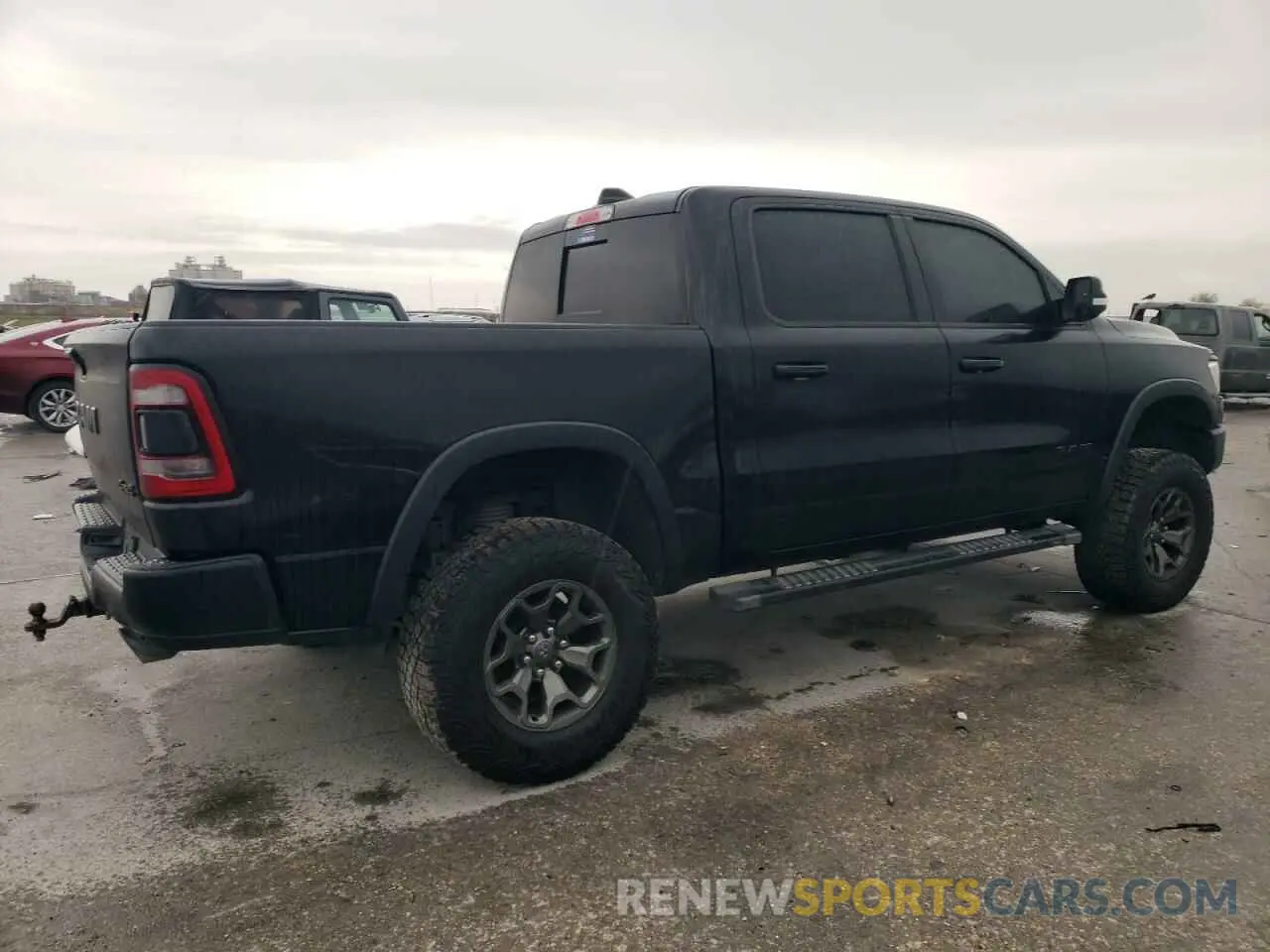 3 Photograph of a damaged car 1C6SRFLT5LN402232 RAM 1500 2020