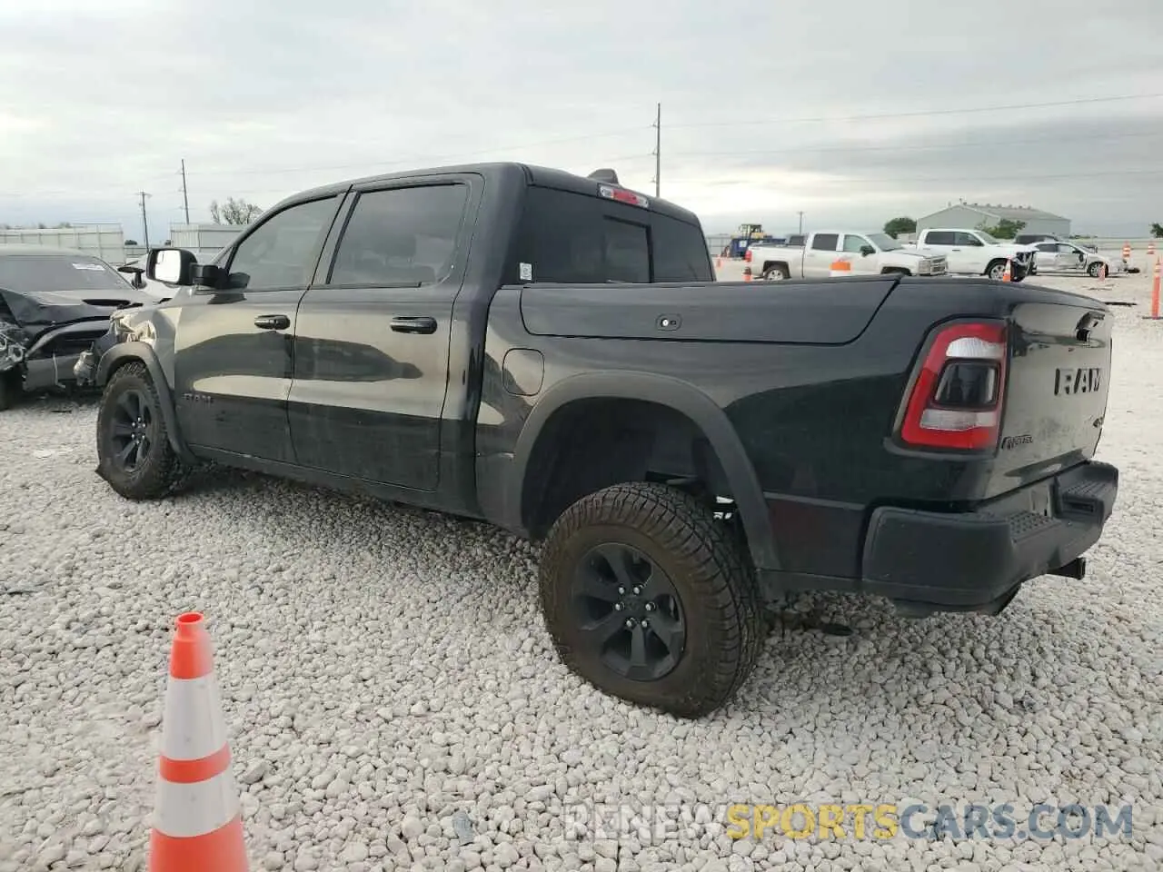 2 Photograph of a damaged car 1C6SRFLT7LN218944 RAM 1500 2020