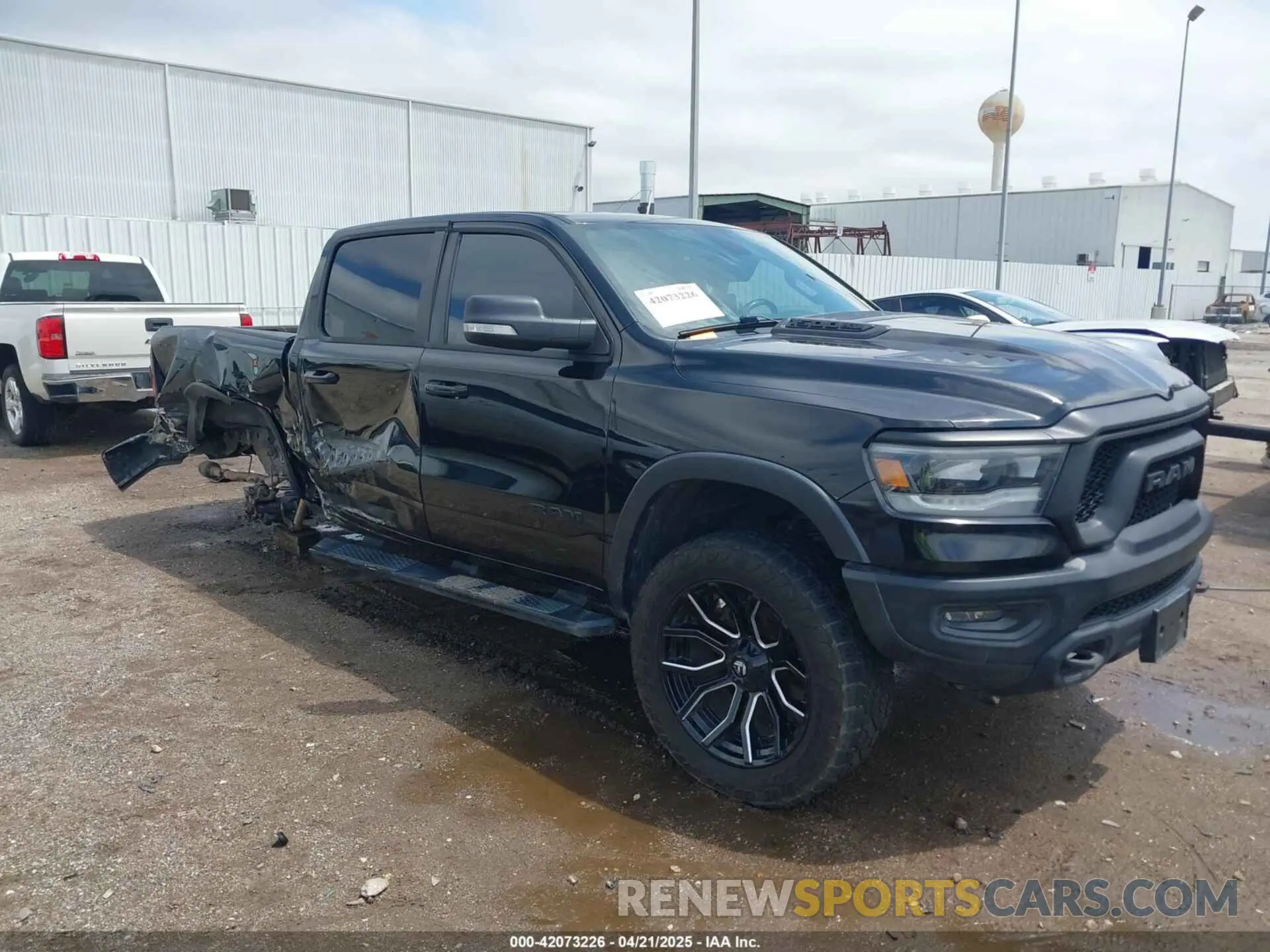 1 Photograph of a damaged car 1C6SRFLT7LN289562 RAM 1500 2020