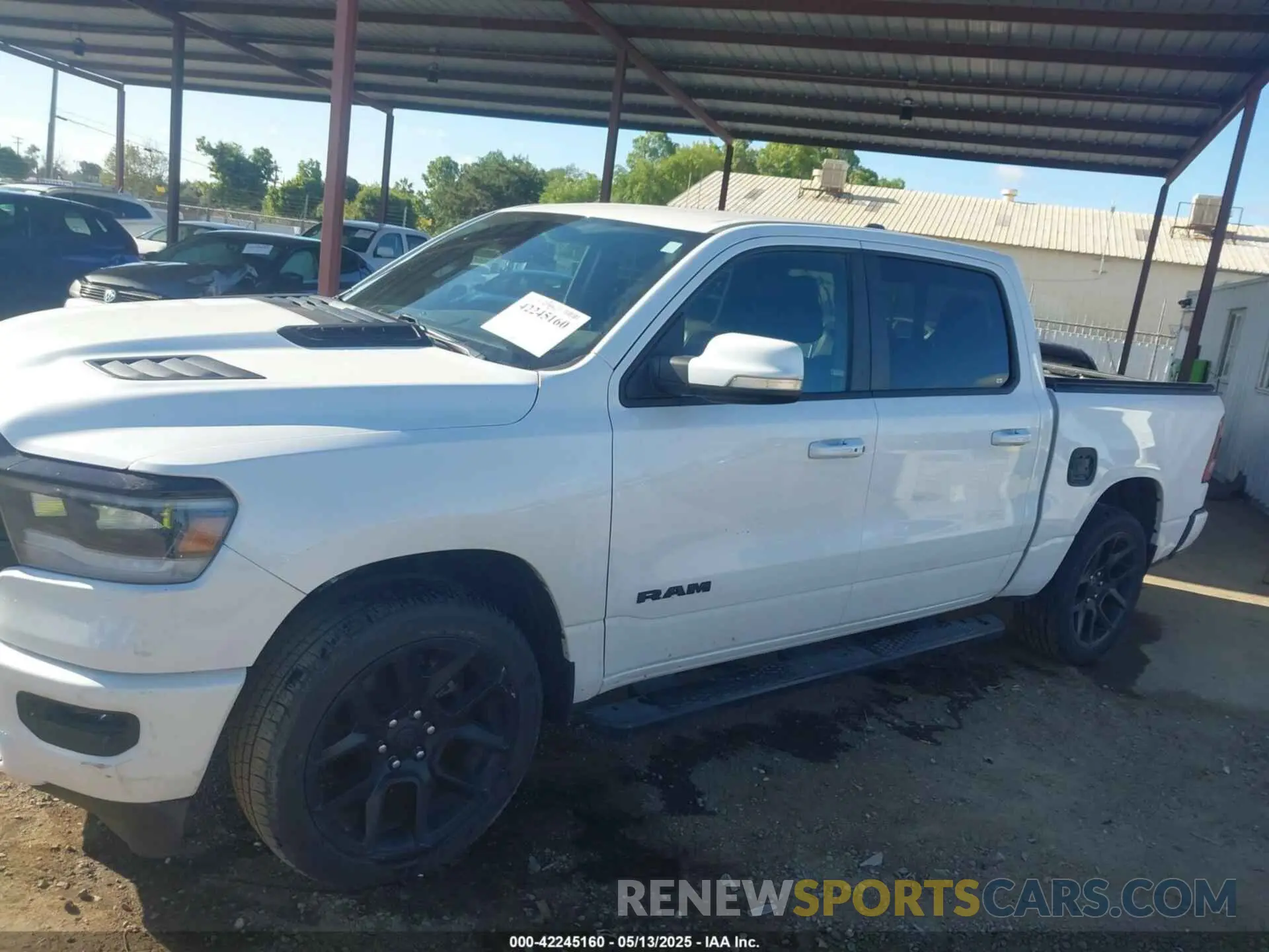 14 Photograph of a damaged car 1C6SRFLT8LN332550 RAM 1500 2020