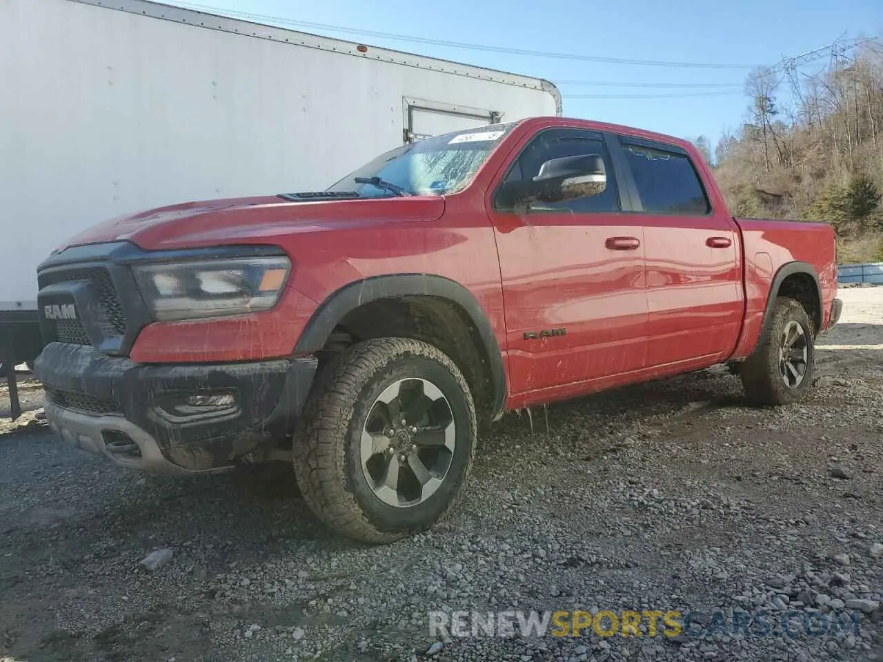 1 Photograph of a damaged car 1C6SRFLT8LN422071 RAM 1500 2020