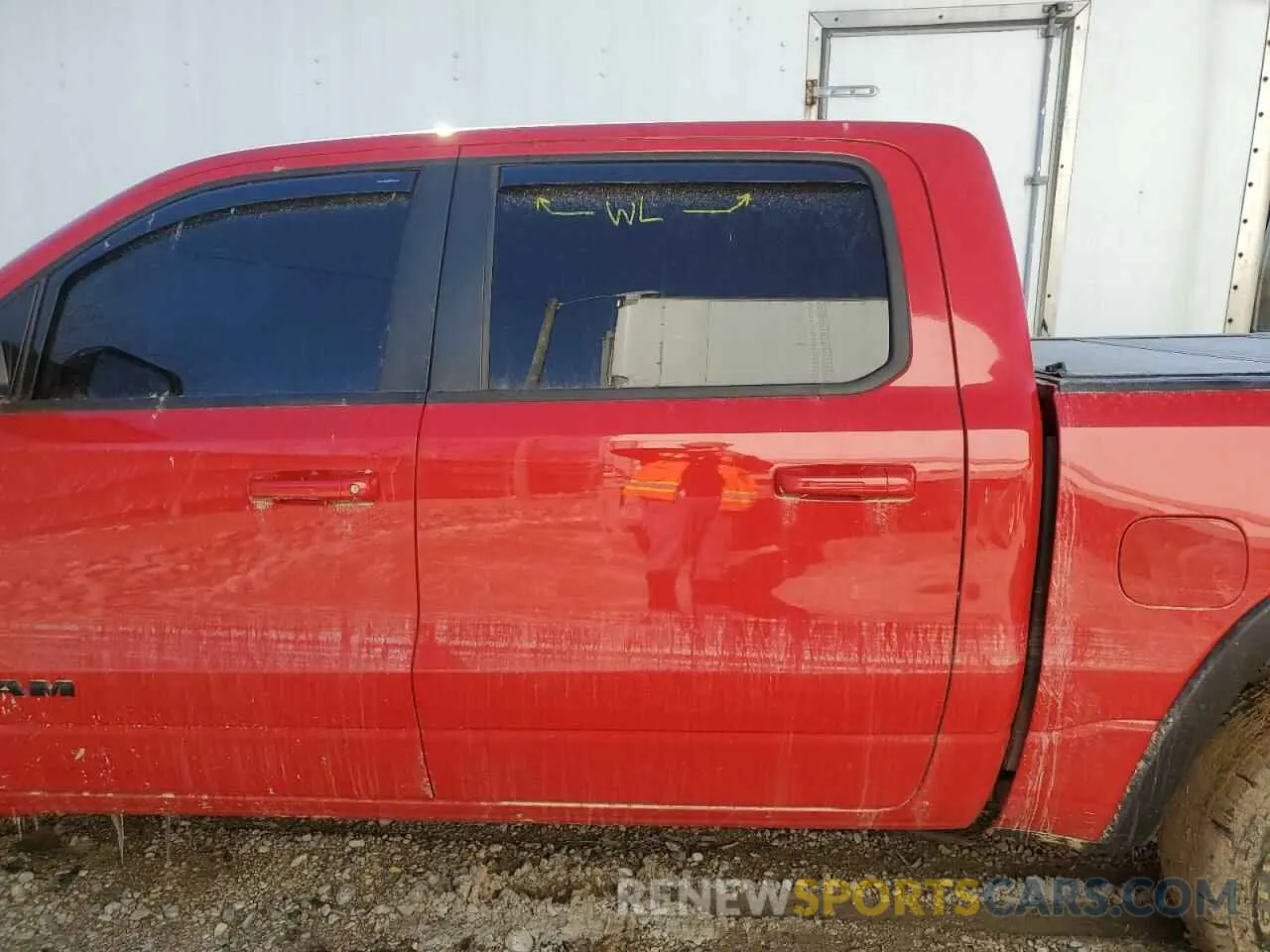 12 Photograph of a damaged car 1C6SRFLT8LN422071 RAM 1500 2020