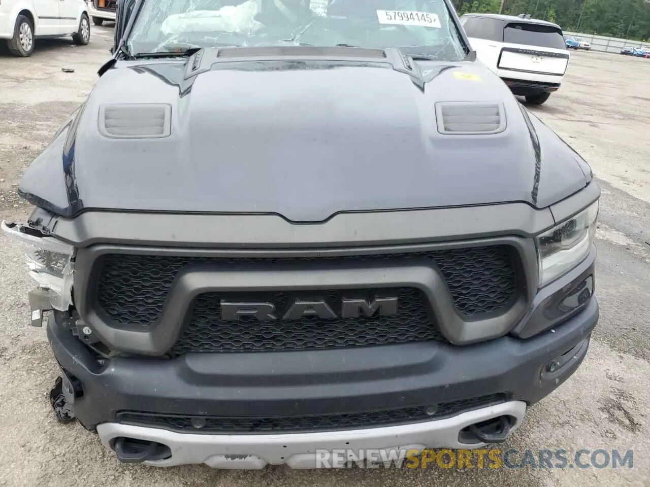 11 Photograph of a damaged car 1C6SRFLT9LN243523 RAM 1500 2020