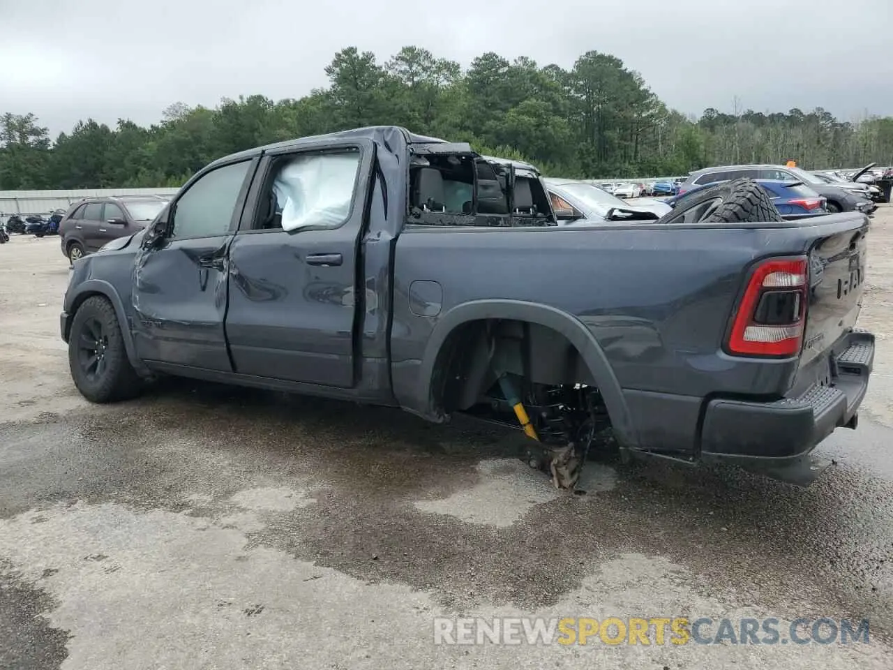 2 Photograph of a damaged car 1C6SRFLT9LN243523 RAM 1500 2020