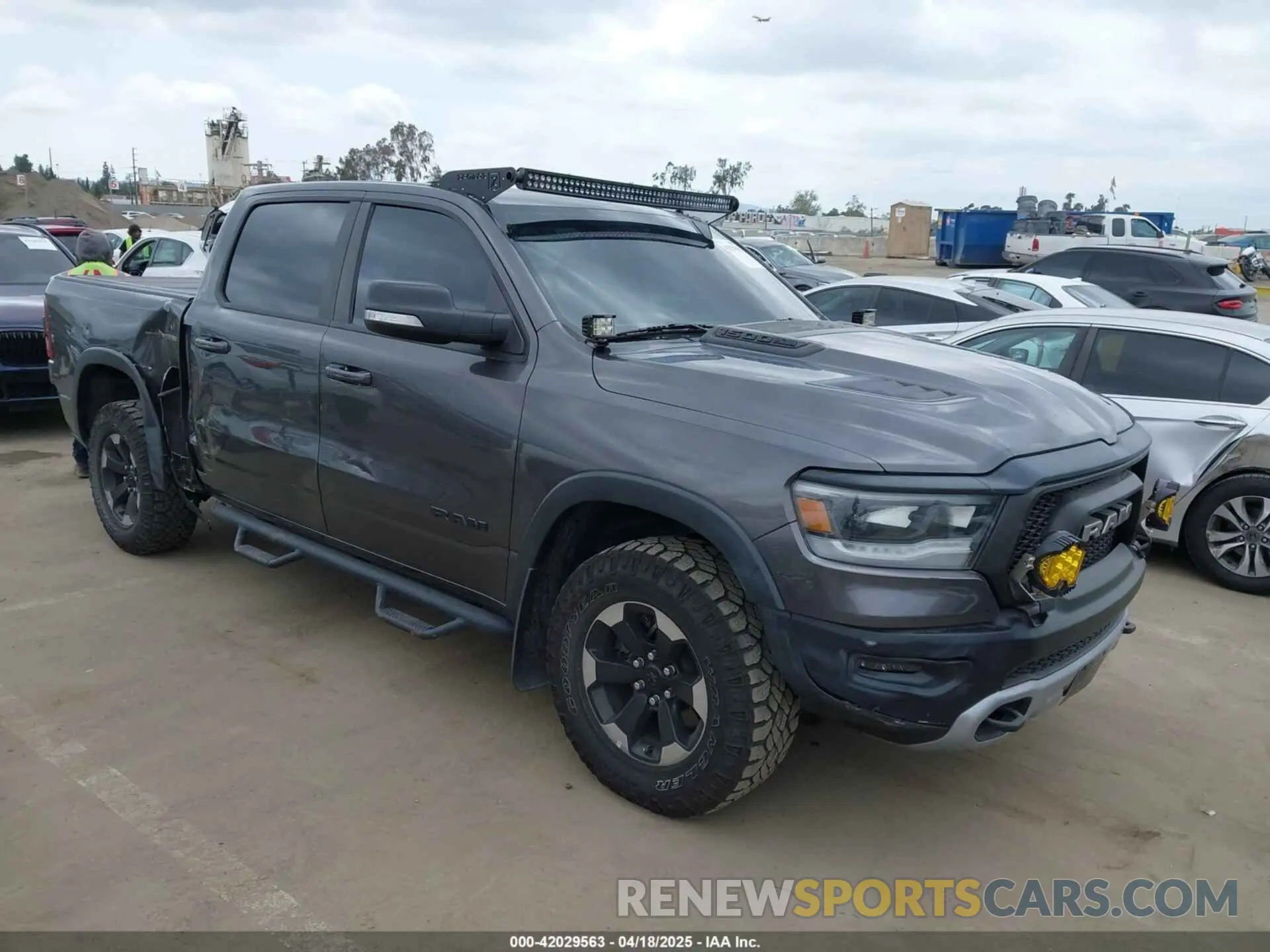 1 Photograph of a damaged car 1C6SRFLT9LN360521 RAM 1500 2020