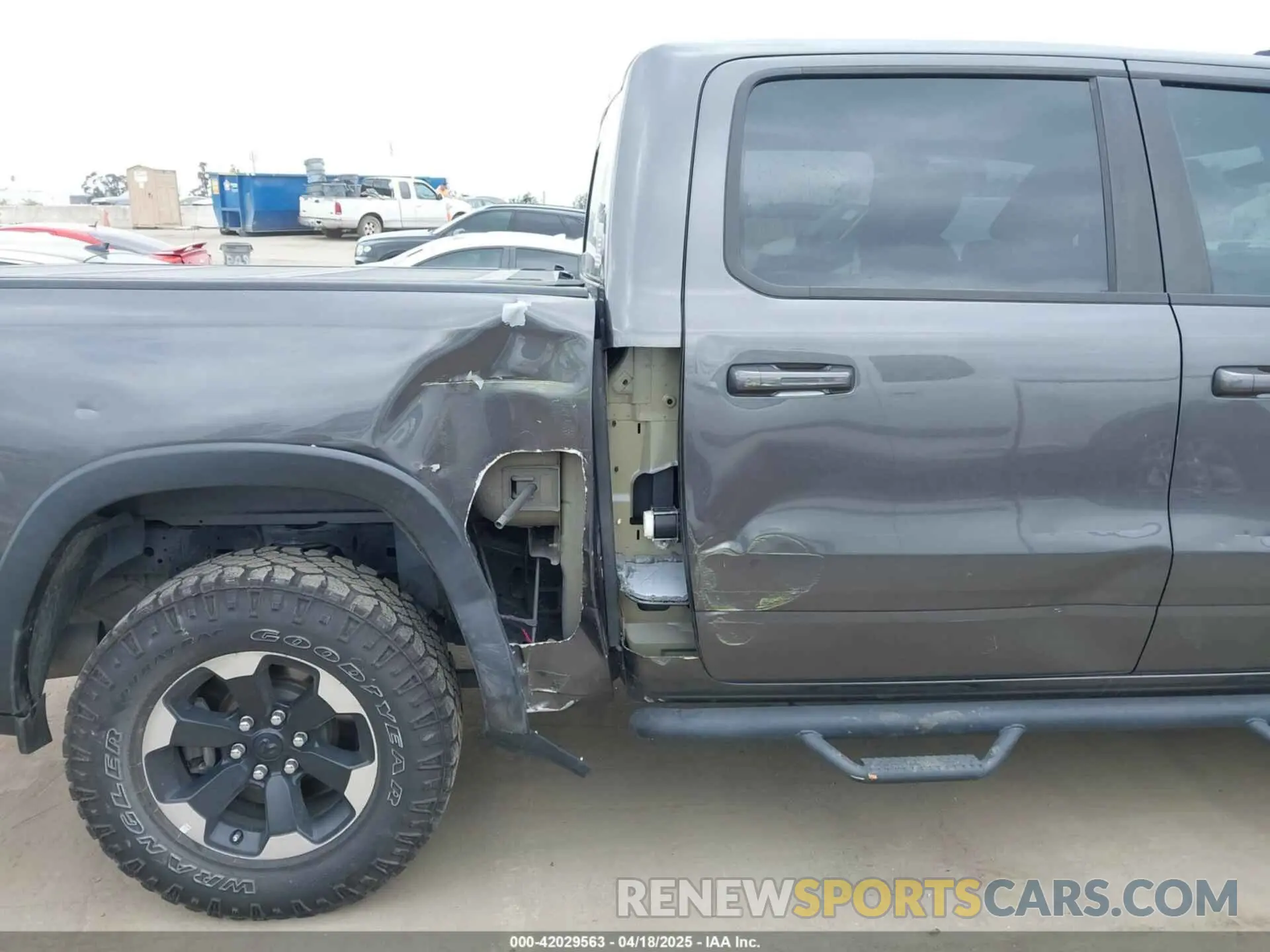6 Photograph of a damaged car 1C6SRFLT9LN360521 RAM 1500 2020