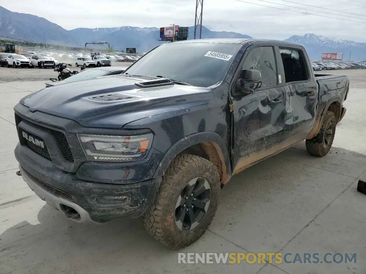 1 Photograph of a damaged car 1C6SRFLTXLN118580 RAM 1500 2020
