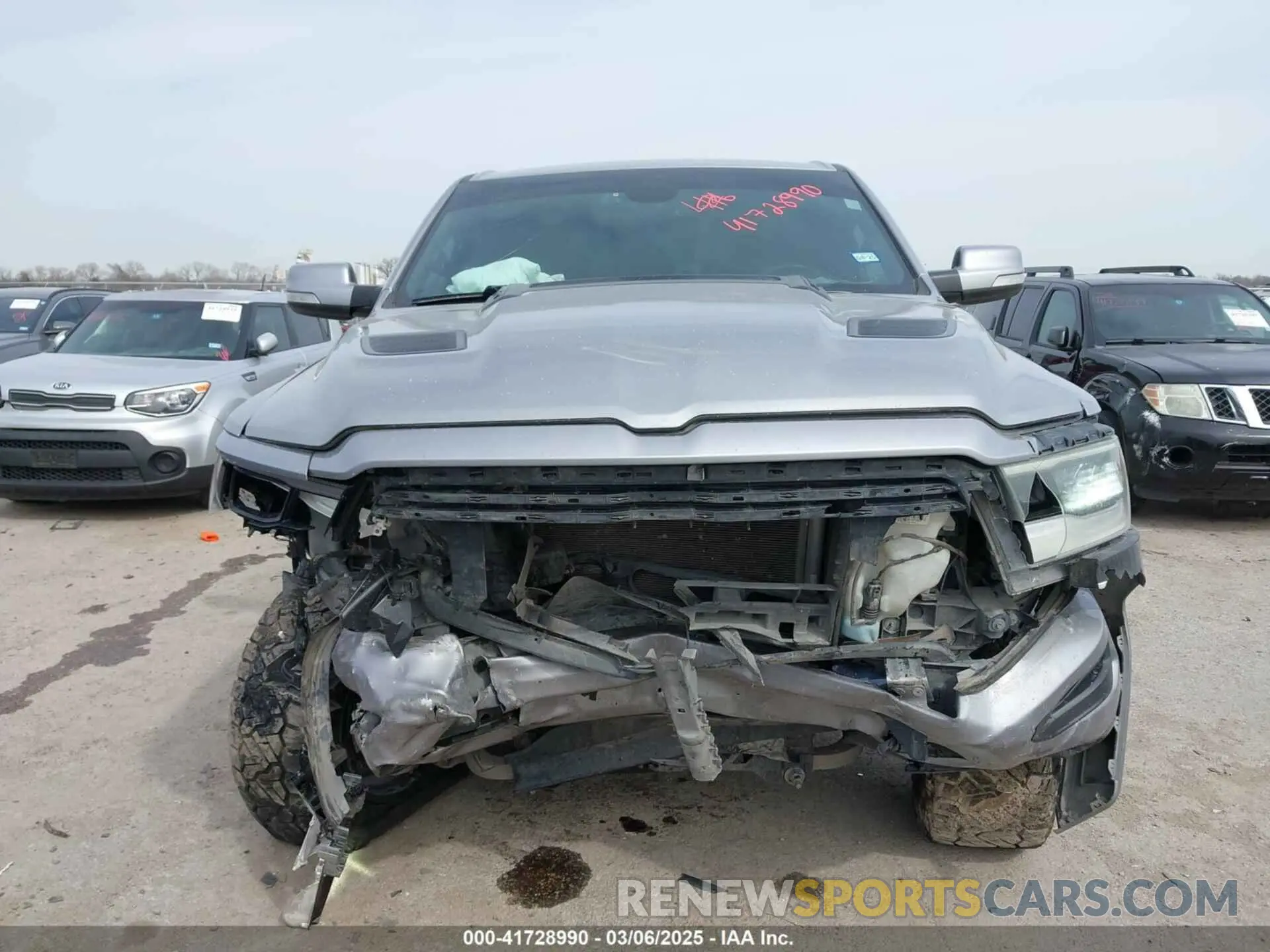 13 Photograph of a damaged car 1C6SRFLTXLN174812 RAM 1500 2020