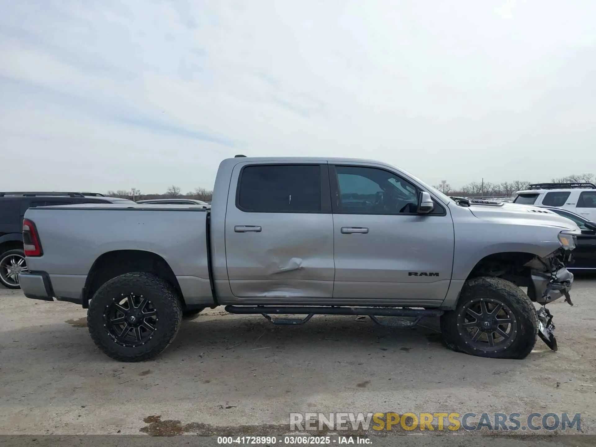 14 Photograph of a damaged car 1C6SRFLTXLN174812 RAM 1500 2020