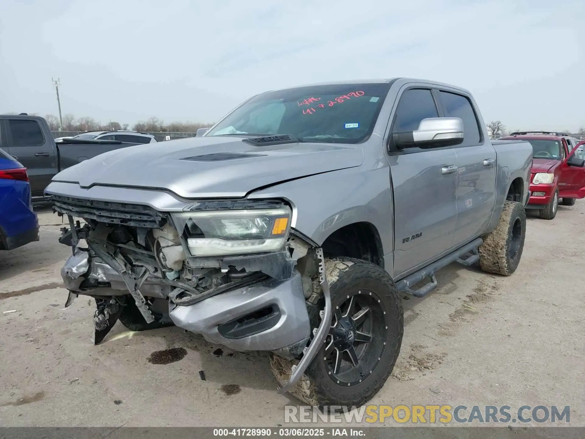 2 Photograph of a damaged car 1C6SRFLTXLN174812 RAM 1500 2020