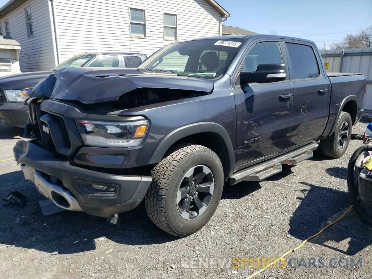1 Photograph of a damaged car 1C6SRFLTXLN342707 RAM 1500 2020