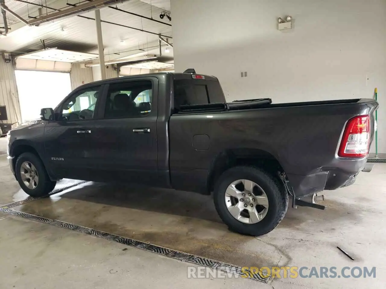 2 Photograph of a damaged car 1C6SRFMT0LN402167 RAM 1500 2020