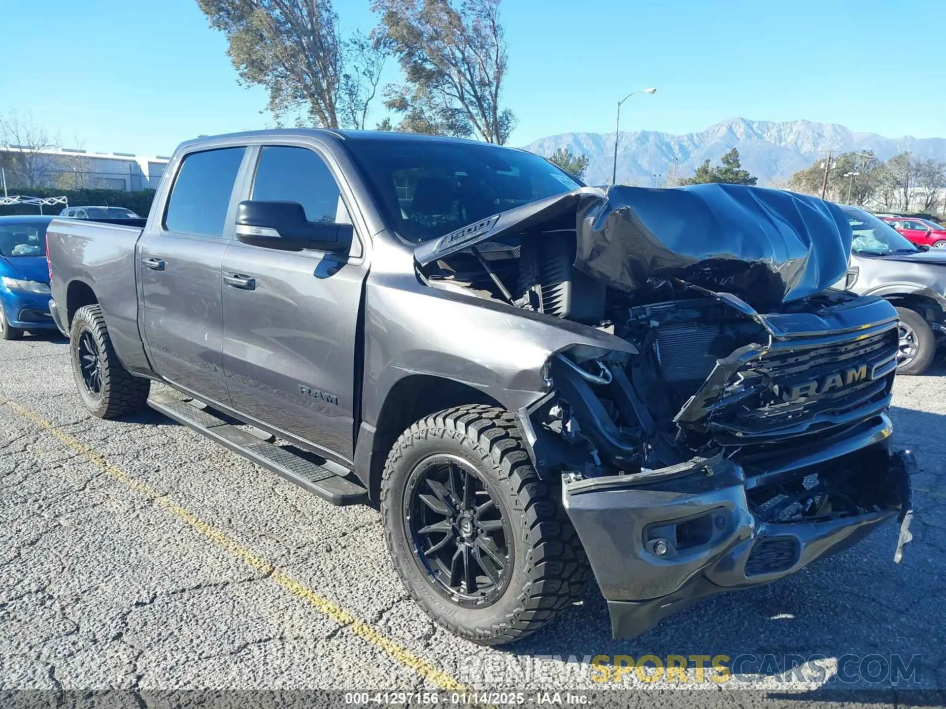 1 Photograph of a damaged car 1C6SRFMT6LN118624 RAM 1500 2020