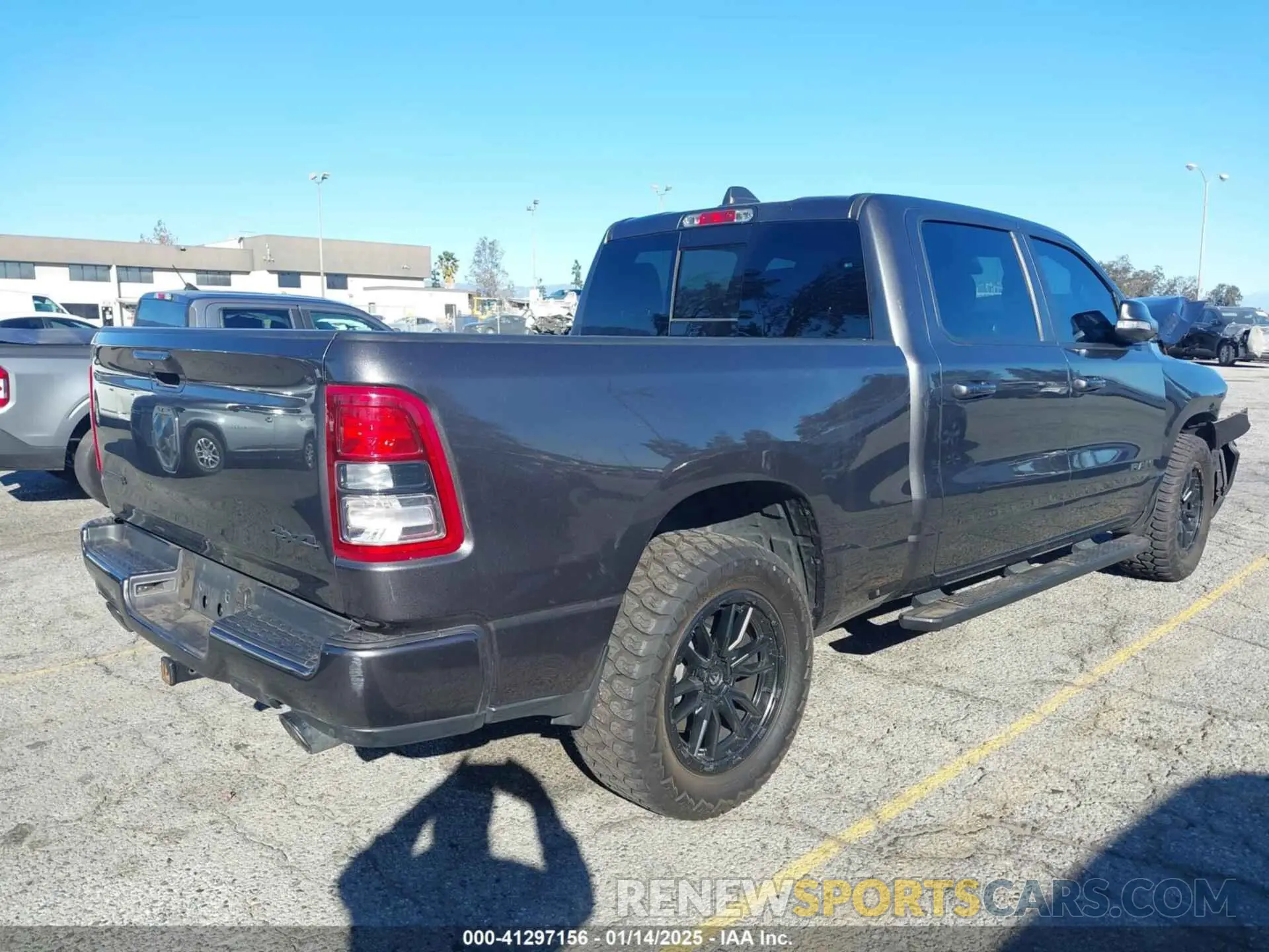 4 Photograph of a damaged car 1C6SRFMT6LN118624 RAM 1500 2020